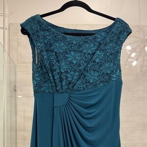 Size 8 knee length sequined teal cocktail dress.